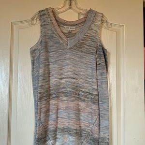 Tunic length cold shoulder sweater